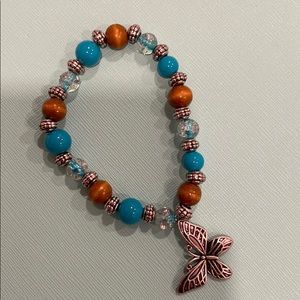 Handmade! Cyan color bracelet w a butterfly charm
